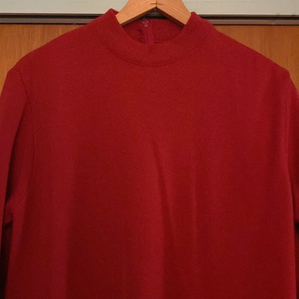 Classic used red sweater by Haymaker with zipper in the back size 42